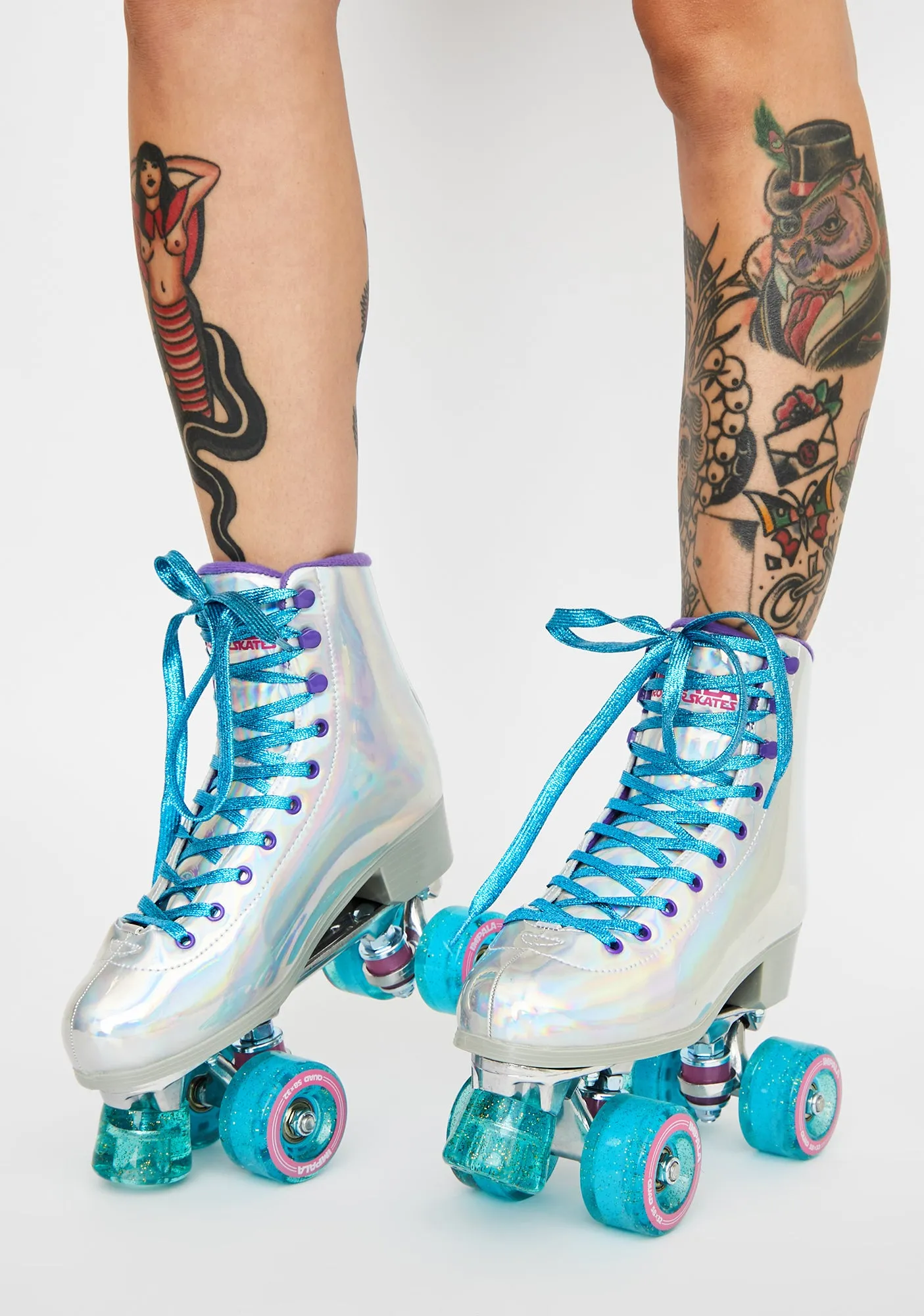 Holographic Impala Quad Skates